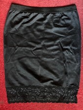 Micro-Jupe ou Jupon Noir - Taille S - Ceinture Élastiquée - 100 % Polyester.