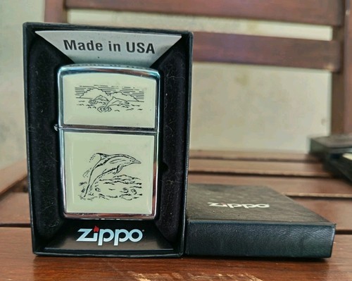 Zippo scrimshaw dolphins - zippo,