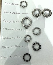 LOT  de 8   Elargisseurs :  anneaux segments ,  avec boule à  clipper,  à visser