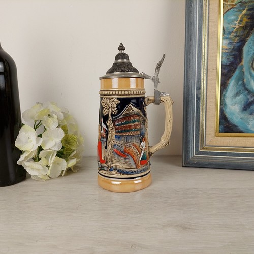 Chope bière avec décor - à,