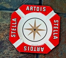 RARE  CENDRIER  EN METAL    STELLA  ARTOIS  SIGNE ROB OTTEN  NEUF