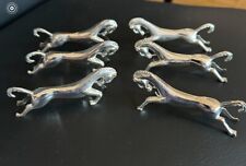 ENSEMBLE DE 6 PORTE-COUTEAUX EN METAL ARGENTE MODELE CHEVAUX