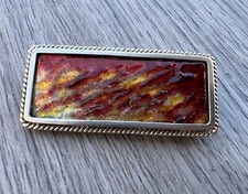 Broche ancienne en emaux de