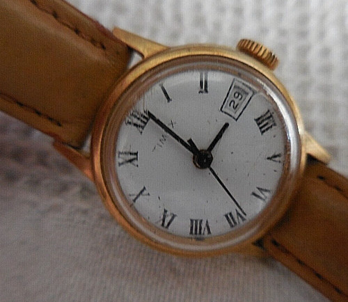 Tres ancienne timex - tres, dame