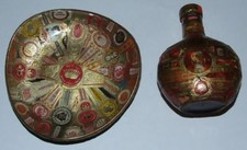 Cendrier décoré de bagues à cigare + une petite bouteille artisanal