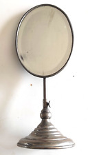 Miroir biseauté ovale réglable en hauteur et inclinable et pivotant vers 1930