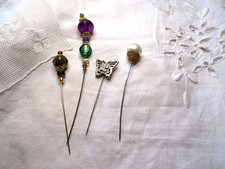 Lot de 4 anciennes épingles a chapeau différentes ( ref 44 )