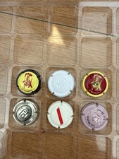 lot de capsules de champagne « La Museleuse «