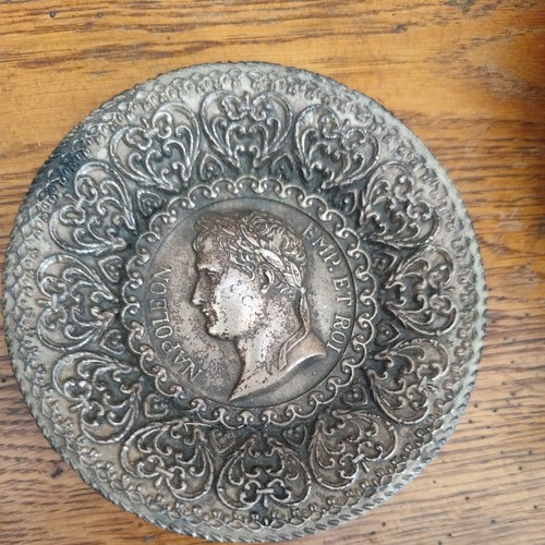 Une médaille forme de - médaille,