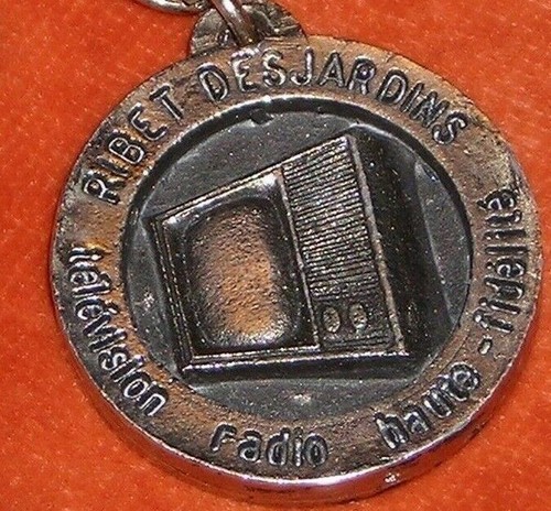 Porte clés key - ring, radio