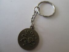 porte cle astrologique couleur bronze lion