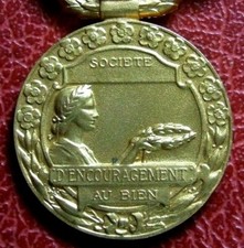 Art Deco encouragement to property gold plated medal
