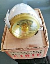 ancien phare projecteur de bicyclette Cibié dans sa boîte d'origine