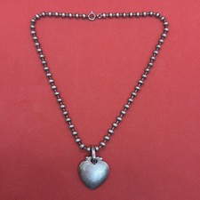 Collier boules pendentif cœur