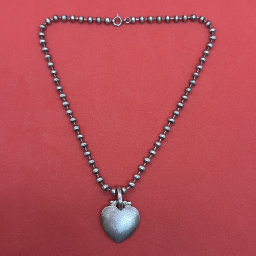 Collier boules pendentif cœur