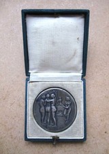 Ancienne médaille Le journal