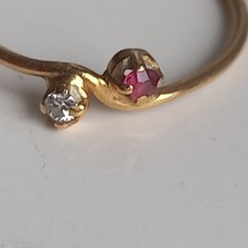 bague or 18 k poinçon tête