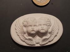 Médaillon en platre miniature
