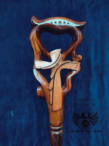 Canne bois sculptée la - en, À