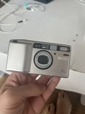 Ricoh R1s 35mm compact – pour pièces – s’allume LCD OK moteur OK déclencheur HS