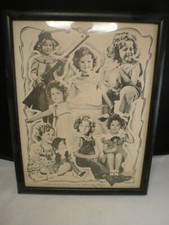 SHIRLEY TEMPLE, FRAMED 8 BY 10 INCH PHOTOGRAPH WITH ONE OF HER SHIRLEY DOLLS, 
