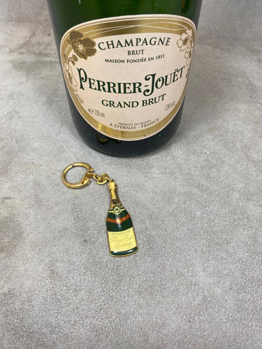 Rare porte clés - rare, perrier