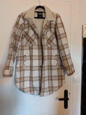 manteau a carreaux Baige