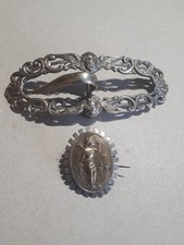 Broche et boucle de ceinture XIX ème .  Métal argenté