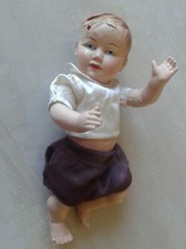 Poupon/Baigneur Ancien en Celluloïd accidenté (30 cm) et vêtements