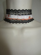 Collier ras cou noir et orange
