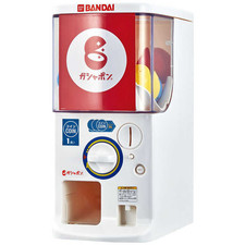Distributeur de jouets capsule