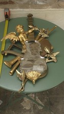 Miroir ancien d'un ange sur bois doré des années 40 ou 50