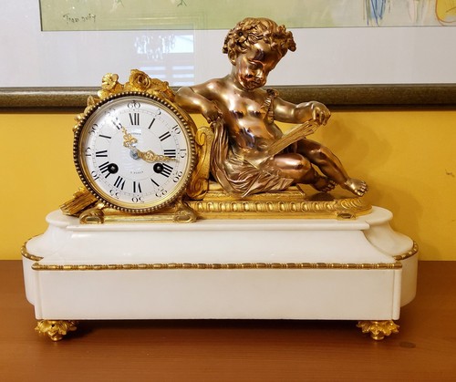 Pendule putto étude en - l'étude",