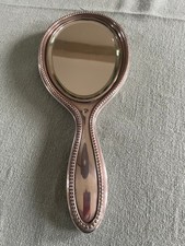 Miroir face à main ancien en