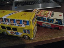 Deux bus tole a friction made in china.