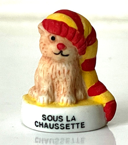 Fève chat sous la - chat,