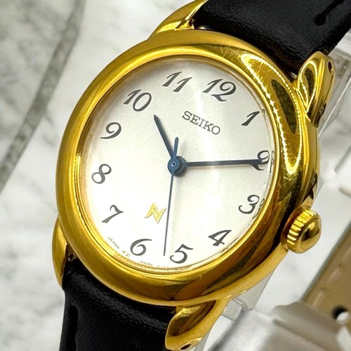 Montre ronde quartz - ronde, à