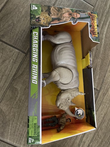 Jumanji charging rhino action - rhino,