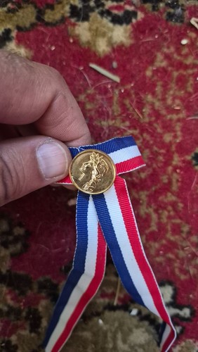 Médaille ancienne dorée