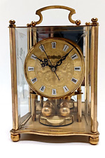 Ancienne Pendule "HETTICH" à poser 4 glaces, laiton doré