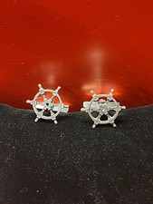 Boutons de manchettes argent