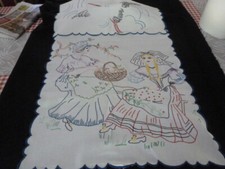  très joli cache torchon