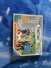 JEU  TINTIN . QUI A ENLEVER LE