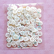 Boutons ronds blancs en nacre