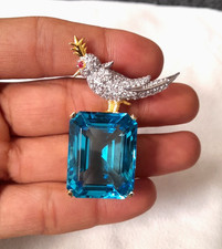 Ancienne broche oiseau aigue-marine créée en laboratoire pour femme/homme...