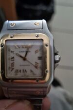 vend montre cartier Santos homme acier or chiffres romains en or uniquement fait