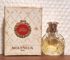 Eau de Toilette Fête de Molyneux 5ml. Boîte légèrement tâchée. Plein. Bon état