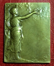 Art Nouveau victory standing with laurel crown medal by Felix Rasumny
