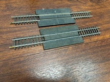 Lot de deux rails de passage a