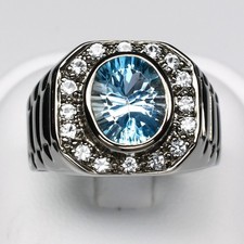 Bague argent 925 rhodié noir avec topaze bleue et blanches  T62